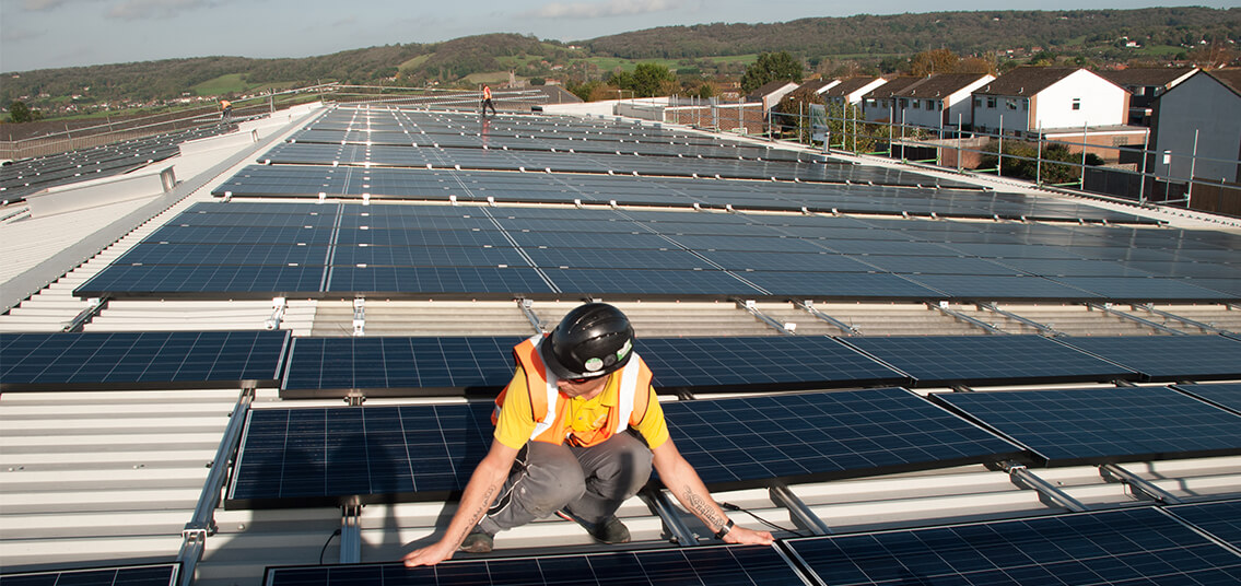 Brabantia solar panels being installed by engineer