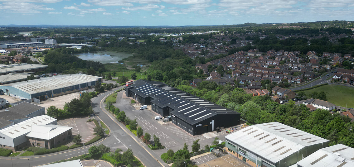 Lush cosmetics solar panel installation drone shot